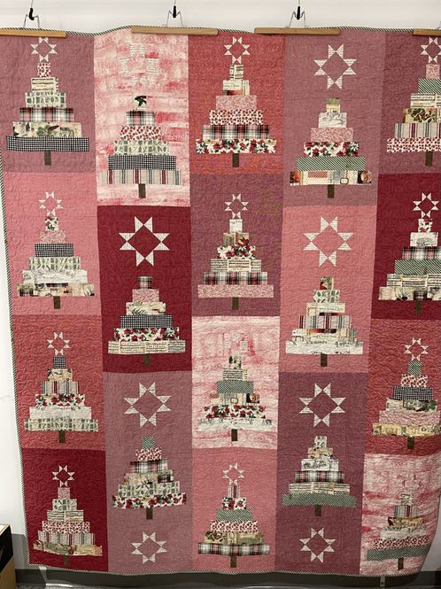 Hovedbilde En flott quilt med juletrær ...