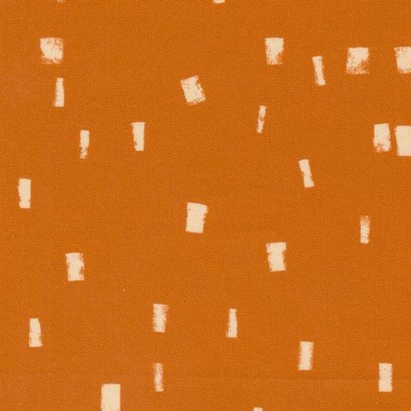 Mørk orange med hvite små firkanter